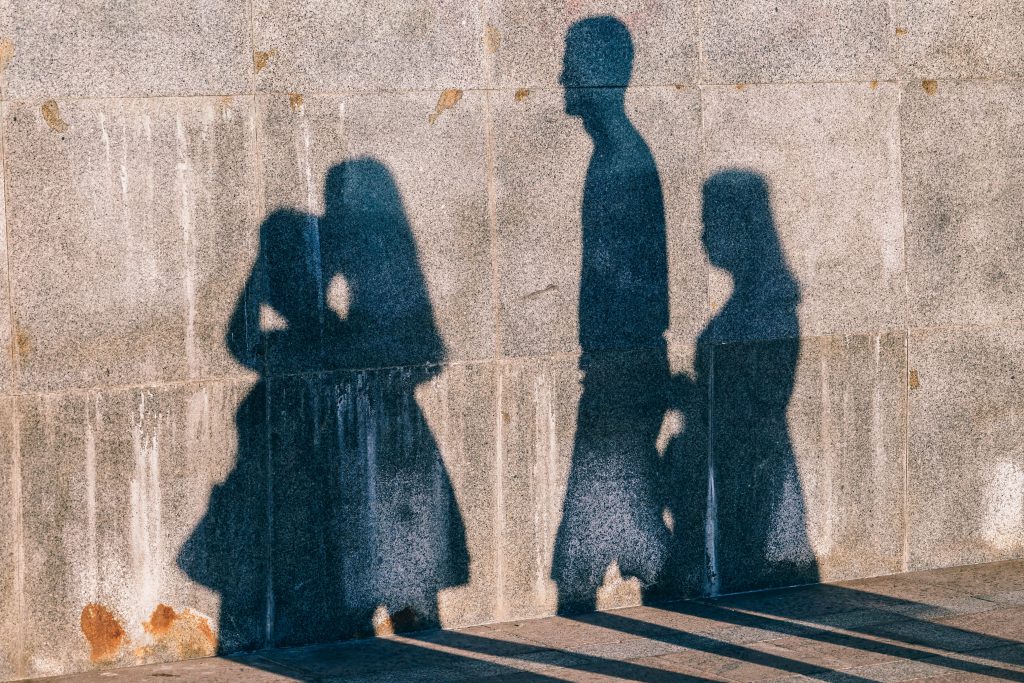 shadows of people on concrete